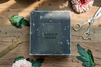 Grunge metal blue box mockup on a wooden table