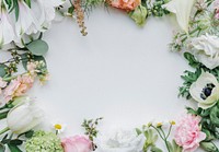 Fresh flowers frame on a white background