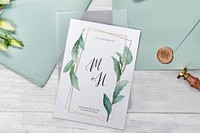 White lisianthus with a wedding invitation card mockup