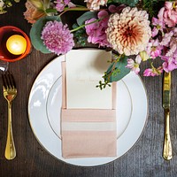 Invitation card mockup on a plate in a reception