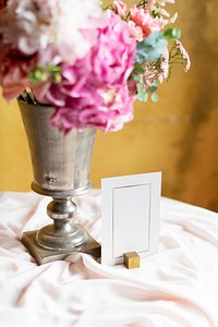 Flower vase by a card mockup