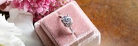 Beautiful flowers by a diamond ring