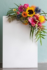 Blank white paper with a bouquet with colorful flowers