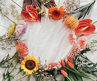 Fresh flower round frame on white background