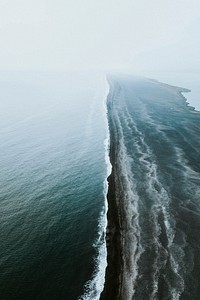 Drone shot of Reynisfjara black sand beach in Iceland