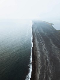 Drone shot of Reynisfjara black sand beach in Iceland