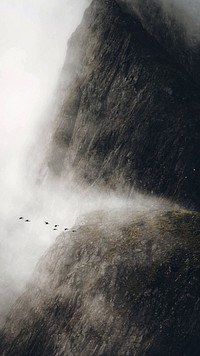 View of a misty Krossanesfjall mountain in Iceland