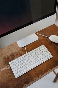 Computer on a wooden desk