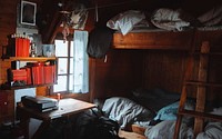 Wooden cozy bedroom in a cabin