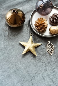 Festive Christmas ornaments on a gray background