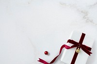 Present wrapped with a red velvet ribbon