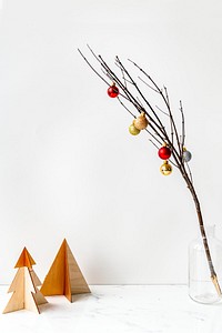 Baubles on a branch in a vase