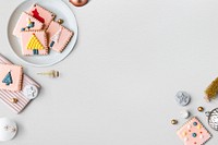 Pink Christmas biscuits on a gray background