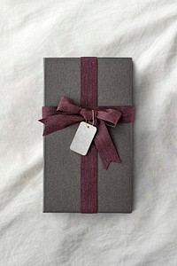 Aerial view of gift box with a tag mockup