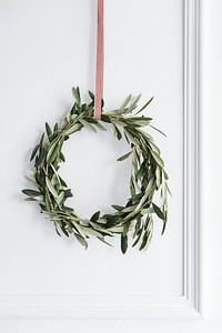 Christmas wreath with a red ribbon hanger