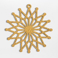 A gold snowflake Christmas ornament