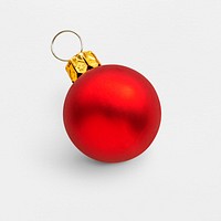 A shiny red ball Christmas ornament isolated on gray background