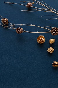 Golden pinecones on a branch