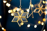 Festive golden snowflakes and stars hanging