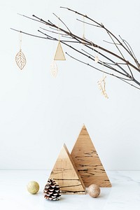 Wooden triangle showpiece on a marble table