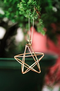 Festive golden star on Christmas tree