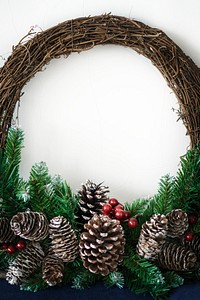 Festive Christmas wreath against a white background