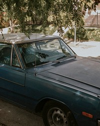 Old classic car parked by the road in Los Angeles