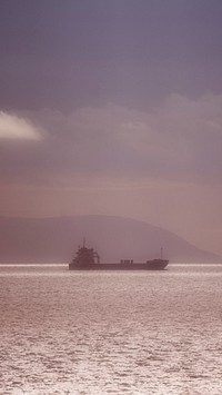 Cargo ship near the Isle of Skye mobile phone wallpaper