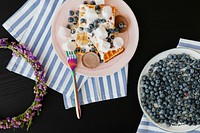 Blueberry and marshmallows over crispy extra everything waffles