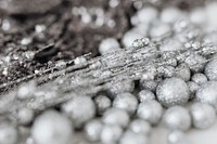 Glitter silver baubles and sequin textile