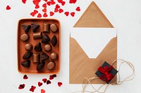 Chocolates in a tray by a card 