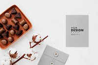 Valentines day chocolate by a card mockup 