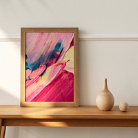 Wooden picture frame mockup psd with colorful painting