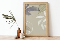 Picture frame mockup on a wooden sideboard table 