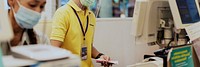 Cashiers in a supermarket during covid-19 pandemic. BANGKOK, THAILAND, 24 March, 2020