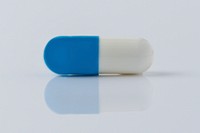 Pill for viral disease on a white background