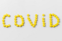 Pills for COVID-19 on a white background