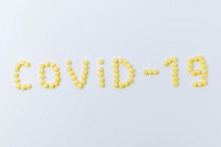 Pills for COVID-19 on a white background
