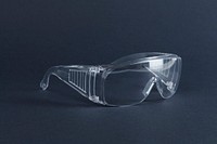 Clear goggles on a dark blue background