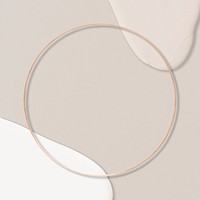 Round gold frame with white and nude paint splash border on transparent background