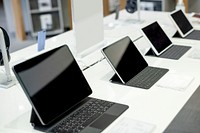 Tablets lined up on display at a shopping mall