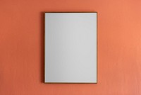 Blank picture frame hanging on a wall