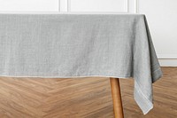 Minimal tablecloth on a table in a dining room