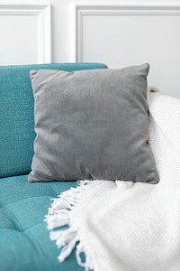 Minimal cushion cover in gray on a sofa