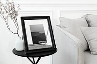 Tabletop picture frame mockup psd on the living room&rsquo;s table