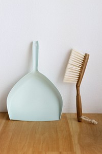 Dustpan and cleaning brush living essentials in lifestyle concept