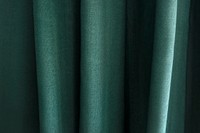 Closeup of green textile with pleats