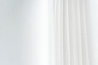 White pleated curtain in a living room