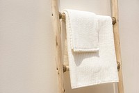 Towels hanging on a ladder minimal and aesthetic minimal interior design