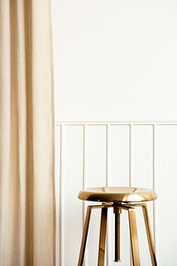 White wall with golden stool and curtain luxury interior